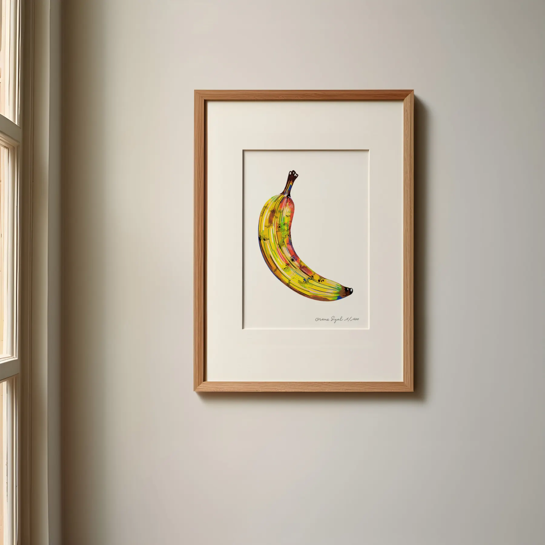 Banane jaune mouchetée de touches colorées sur fond blanc, tirage d'art illustré par Orane Sigal